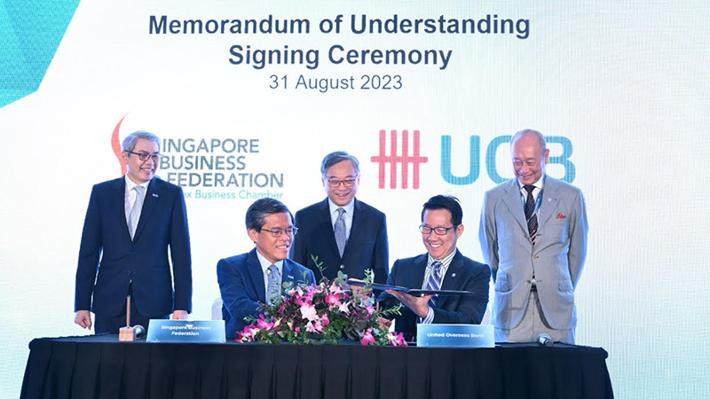 Signing of MOU between UOB and Singapore Business Federation.