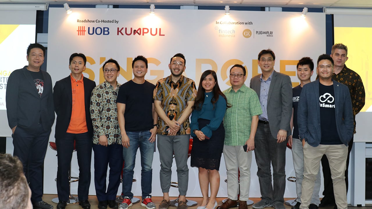 Many hands make light work: the team behind the Singapore FinTech Festival roadshow in Indonesia.